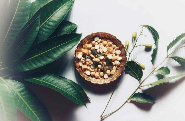 Bevu Bella recipe prepared using roasted gram, jaggery, and neem while celebrating the Ugadi or yugadi festival